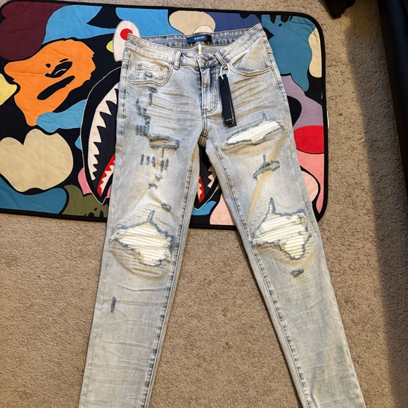 AMIRI Light Blue Distressed Skinny Jeans - Picture 1 of 4
